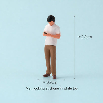 1:64 Summer Waiting Scene Miniature Figure Series - Man in White Top Looking at His Phone Figure