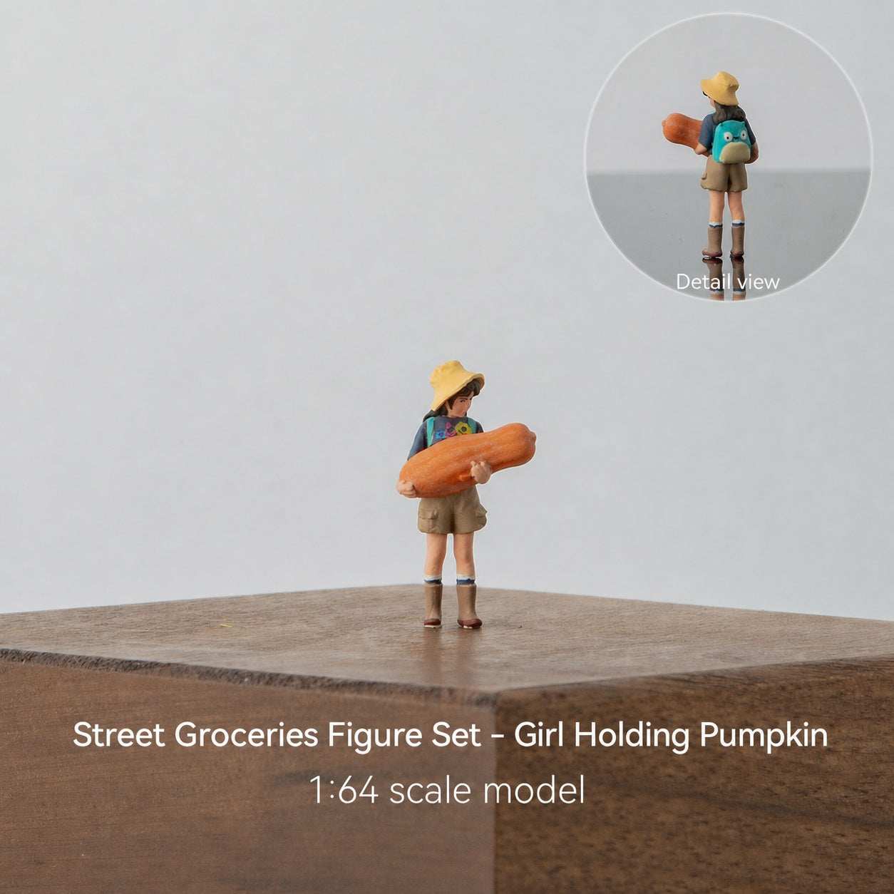 1:64 Street Shopping Miniature Figure Series - Little Girl in Rain Boots Holding a Pumpkin Figure