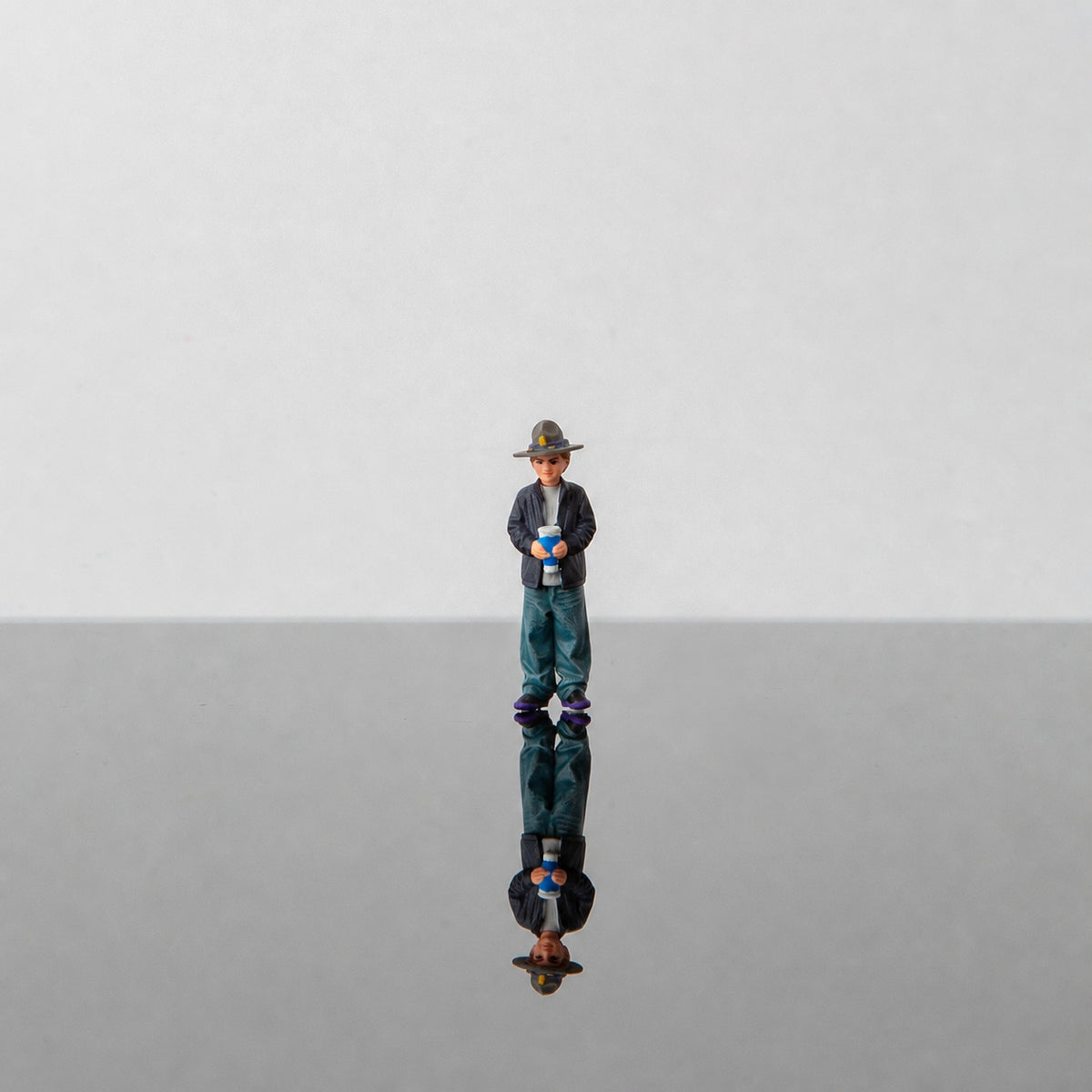 1:64 Georgia State Patrol (GSP) S1 Miniature Figure & Prop Series - Boy Wearing a State Trooper Hat Figure