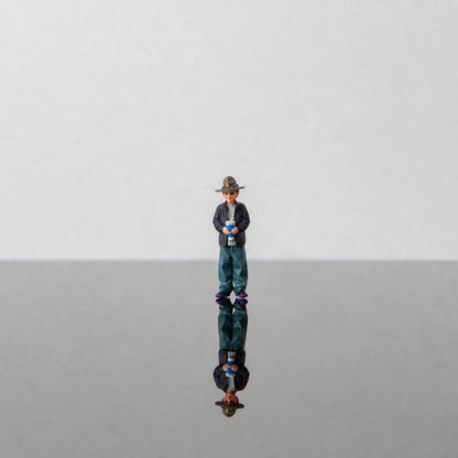 1:64 Georgia State Patrol (GSP) S1 Miniature Figure & Prop Series - Boy Wearing a State Trooper Hat Figure