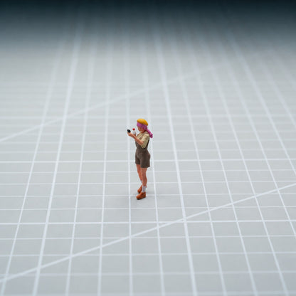 1:64 Street Hot Dog & Ice Cream Miniature Diorama Series - Standing Woman in Brown Overalls Holding Ice Cream and Taking a Selfie Figure