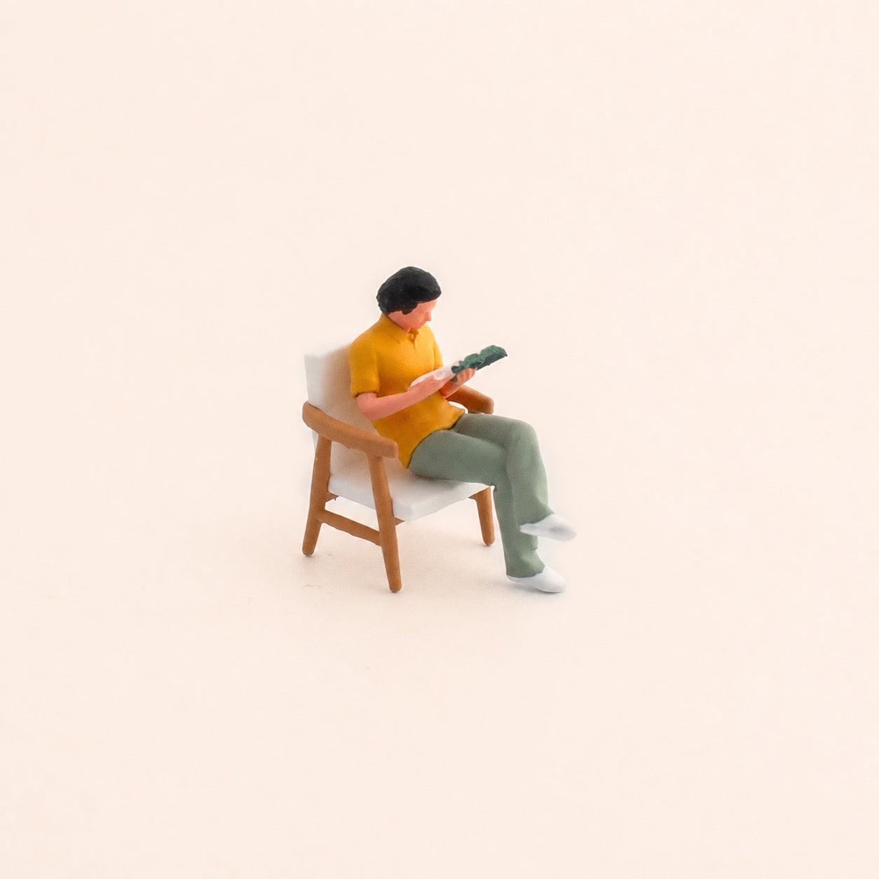 1:64 Reading Figures & Chairs Miniature Diorama Series - Seated Man in Yellow Top Reading a Magazine with Wooden-Arm Lounge Chair Diorama Set