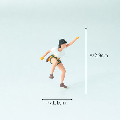 1:64 Rock Climbing Miniature Figure Series - One-Handed Female Rock Climber in Yellow Shorts Figure