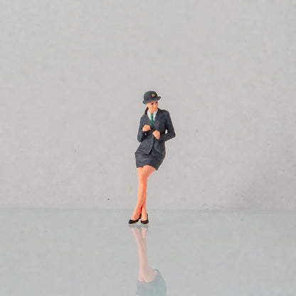 1:64 Police Chief for a Day Miniature Figure Series - Leaning Female Police Officer Figure