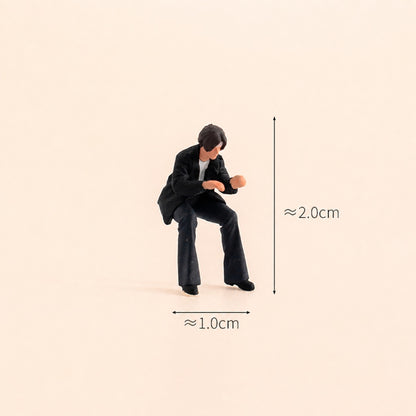 1:64 Arcade Series B Miniature Diorama Collection - Seated Man in Black Leather Jacket Playing a Game Figure