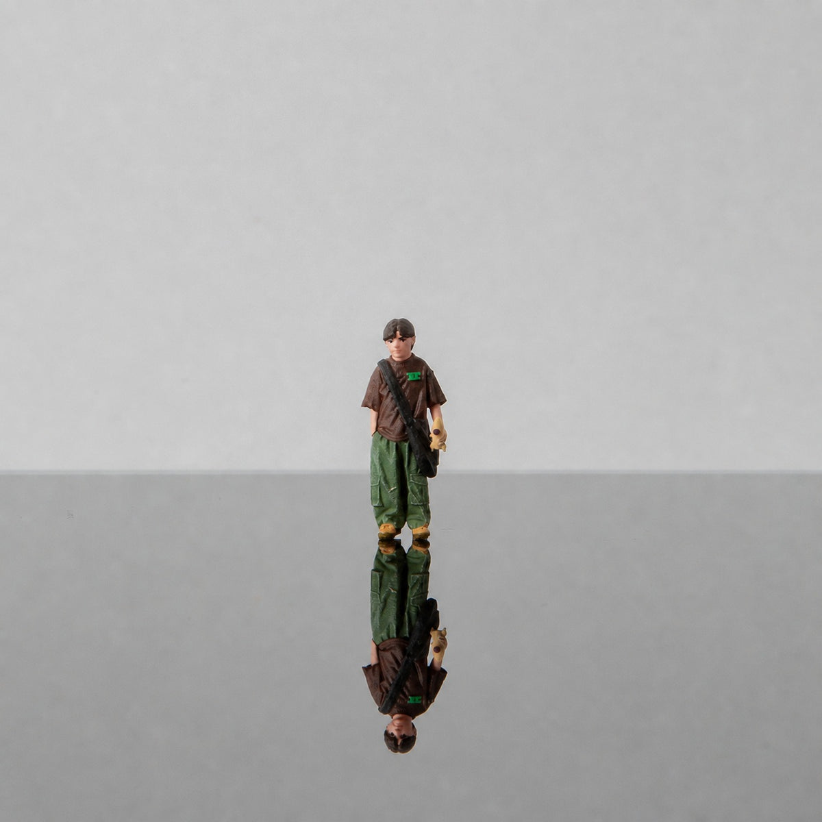 1:64 California Highway Patrol (CHP) S1 Miniature Figure & Prop Series - Boy Holding a Toy Rocket Figure