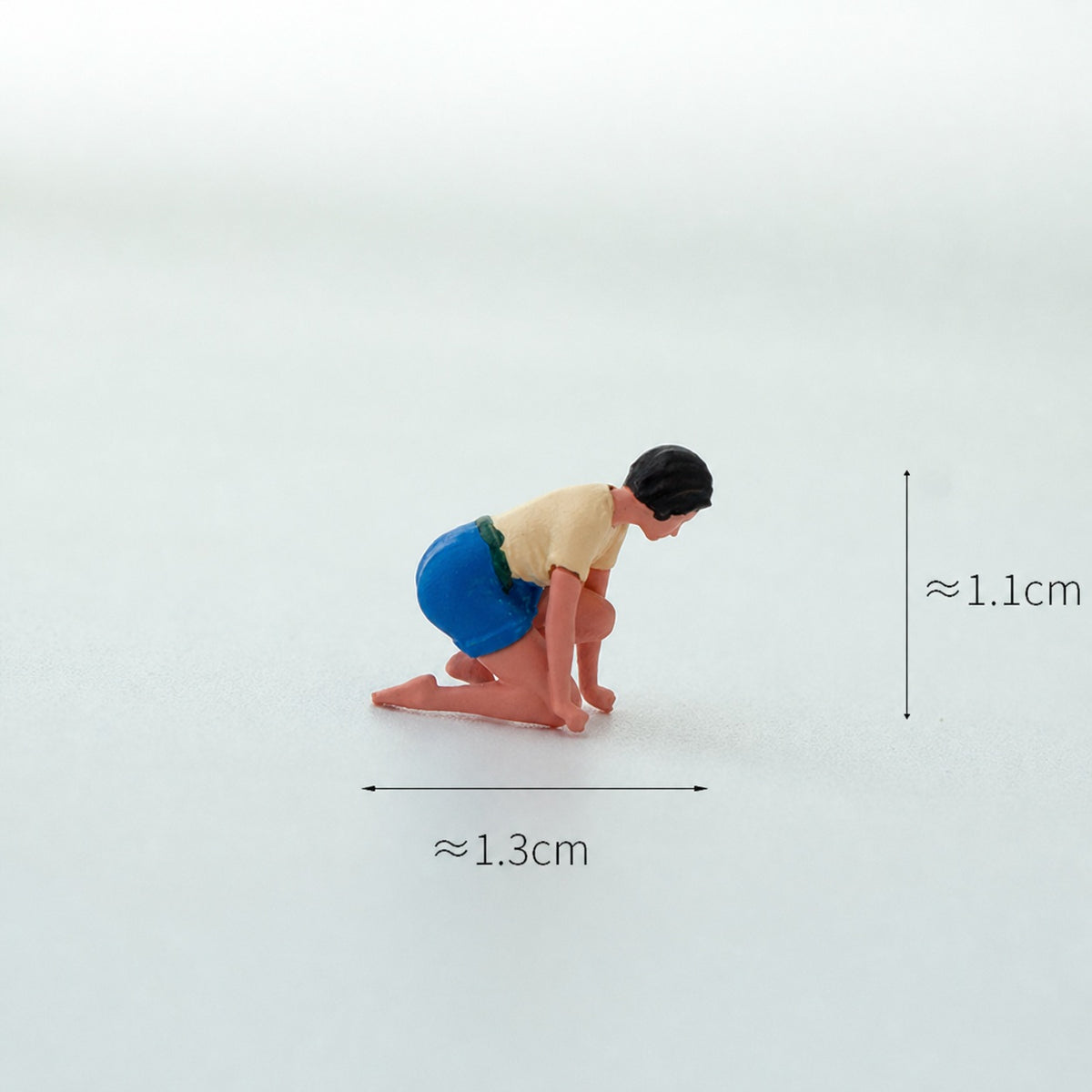 1:64 Tent Camping Miniature Diorama Series - Kneeling Woman in Light Yellow Top Organizing Items Figure