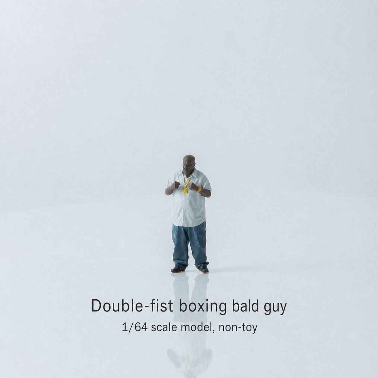 1:64 West Coast Hip-Hop Street Miniature Figure Series - Bald Black Man with Both Fists Clenched Figure