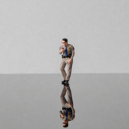 1:64 California Highway Patrol (CHP) S1 Miniature Figure & Prop Series - CHP S1 Male Officer Leaning and Drinking Cola Figure